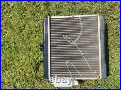 John Deere gator hpx radiator only- OEM origional